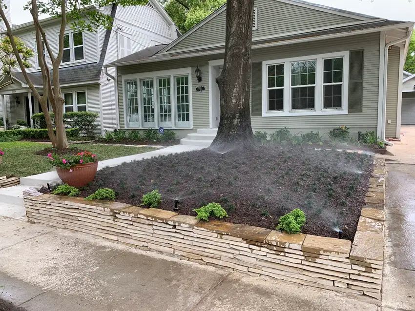 Walkway planting bed with irrigation installed — Irrigation Projects